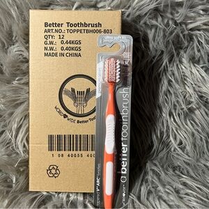 12 Orange and White Toothbrush
